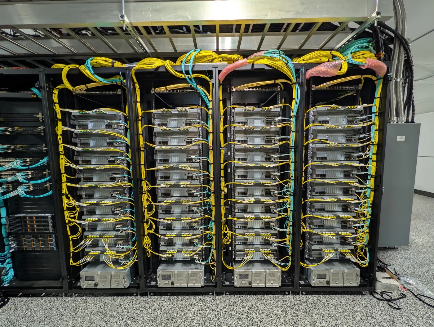 Compute racks and network cabling during a B300 infrastructure deployment